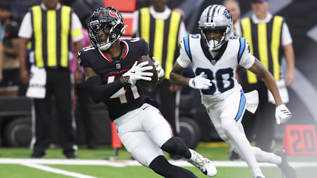 Aug 16, 2025; Houston, Texas, USA; Houston Texans cornerback Damon Arnette (41) runs with the ball after making an intercepti