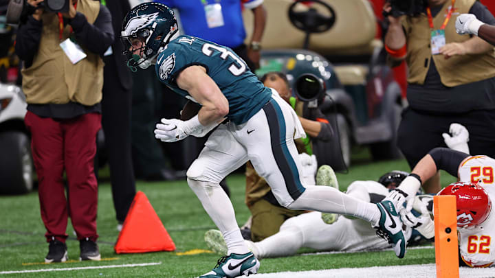 Feb 9, 2025; New Orleans, LA, USA; Philadelphia Eagles cornerback Cooper DeJean (33) scores a touchdown after making an interception against the Kansas City Chiefs during the first half of Super Bowl LIX at Caesars Superdome. Mandatory Credit: Bill Streicher-Imagn Images
