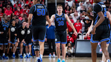 Dallin Hall with last year's BYU Basketball team