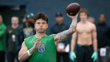 Dillon Gabriel works out at the Oregon Pro Day on March 18. The Browns examined his closely at the Senior Bowl, during interviews and workouts and felt all along that he was their guy.