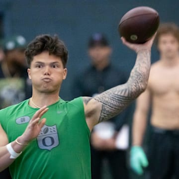 Oregon quarterback Dillon Gabriel throws out a pass during the Oregon football’s Pro Day Tuesday, March 18, 2025, at the Moshofsky Center in Eugene, Ore.