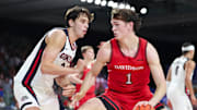 Nov 29, 2024; Paradise Island, Bahamas, BHS;  Davidson Wildcats forward Reed Bailey (1) dribbles as Gonzaga Bulldogs forward Braden Huff (34) defends during the second half at Imperial Arena at the Atlantis resort. 