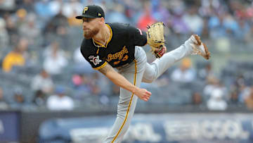 Sep 28, 2024; Bronx, New York, USA; Pittsburgh Pirates relief pitcher Mike Burrows (53) follows through on a pitch against the New York Yankees during the fourth inning at Yankee Stadium. Mandatory Credit: Brad Penner-Imagn Images