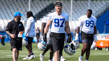 Detroit Lions defensive end Aidan Hutchinson (97) walks off the field after practice during training camp at Meijer Performance Center in Allen Park on Monday, July 21, 2025.