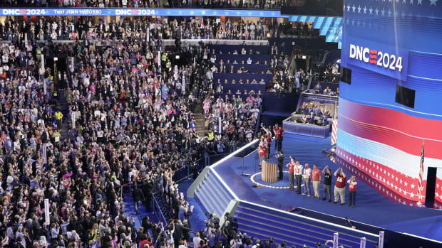 Former Mankato West football players on stage during the third day of the 2024 Democratic National Convention in Chicago.