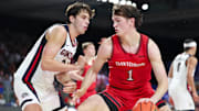 Davidson Wildcats forward Reed Bailey (1) dribbles as Gonzaga Bulldogs forward Braden Huff (34) defends during the second half at Imperial Arena at the Atlantis resort.