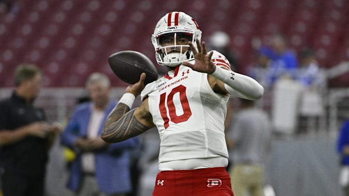 Jun 8, 2025; St. Louis, MO, USA; DC Defenders quarterback Jordan Ta'amu (10) throws during warm ups before the XFL Conference Championship game against the St. Louis Battlehawks at The Dome at America’s Center. Mandatory Credit: Jeff Le-Imagn Images
