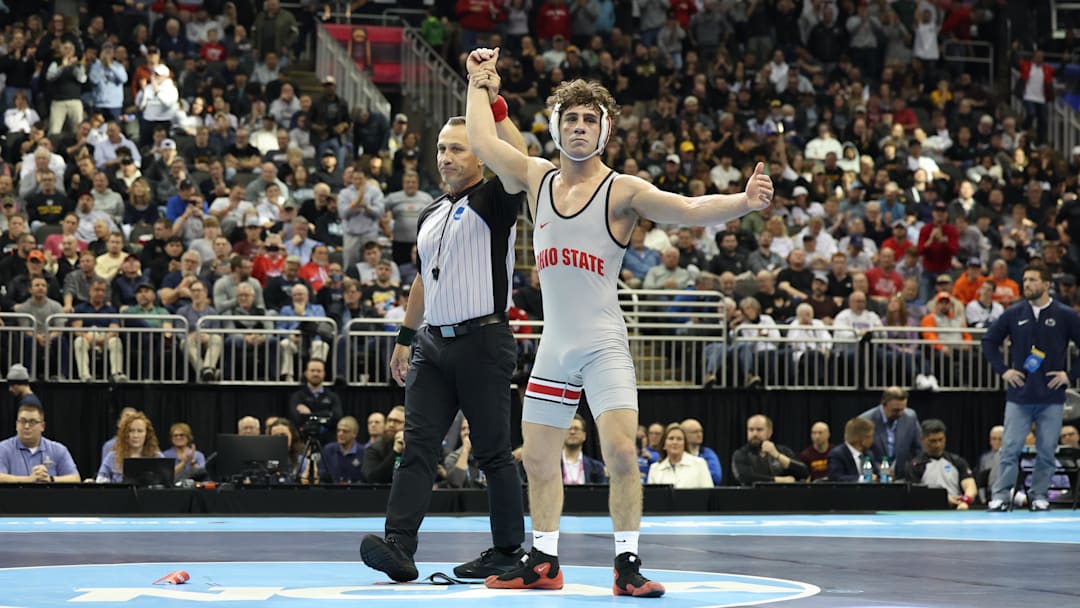 Mar 23, 2024; Kansas City, MO, USA; 141 pounds Ohio State Buckeyes wrestler Jesse Mendez celebrates after beating Penn State Nittany Lions wrestler Beau Bartlett.  Mandatory Credit: Reese Strickland-Imagn Images