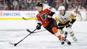 Feb 8, 2025; Philadelphia, Pennsylvania, USA; Philadelphia Flyers left wing Andrei Kuzmenko (96) controls the puck against the Pittsburgh Penguins in the second period at Wells Fargo Center. Mandatory Credit: Kyle Ross-Imagn Images