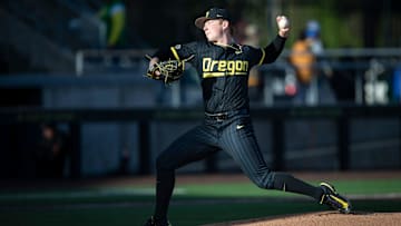 Oregon pitcher Ian Umlandt threw 6.2 innings of four-hit baseball as the Ducks got past Michigan State 4-2 Thursday night in Omaha at the Big Ten Tournament. He struck out five and walked one.