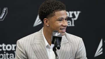 Jun 28, 2025; San Antonio, TX, USA; San Antonio Spurs first round draft pick Carter Bryant answers questions during press conference at Victory Capital Performance Center. Mandatory Credit: Scott Wachter-Imagn Images