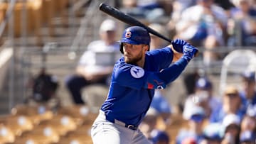 Feb 20, 2025; Phoenix, Arizona, USA; Chicago Cubs first baseman Michael Busch against the Los Angeles Dodgers during a spring training game at Camelback Ranch-Glendale.  Mark J. Rebilas-Imagn Images