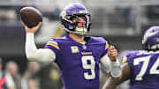 Nov 9, 2025; Minneapolis, Minnesota, USA; Minnesota Vikings quarterback J.J. McCarthy (9) throws a pass against the Baltimore Ravens during the first quarter at U.S. Bank Stadium.