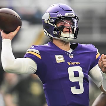 Nov 9, 2025; Minneapolis, Minnesota, USA; Minnesota Vikings quarterback J.J. McCarthy (9) throws a pass against the Baltimore Ravens during the first quarter at U.S. Bank Stadium.