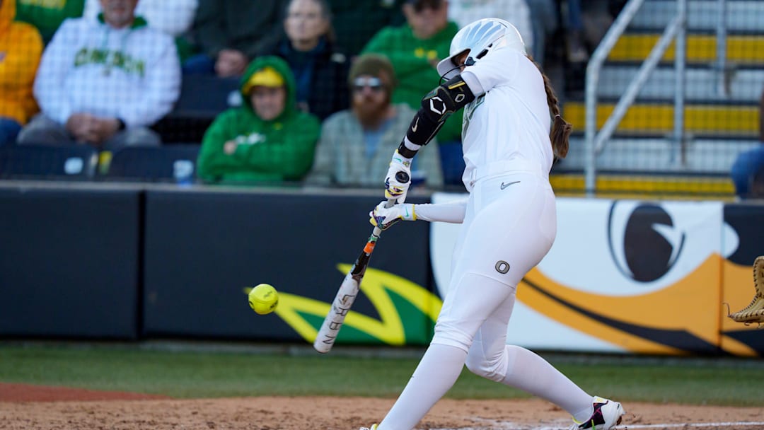 Oregon infielder Katie Flannery gets a hit as the Oregon Ducks host the Ohio State Buckeyes on April 24, 2026, at Jane Sanders Stadium in Eugene, Oregon.