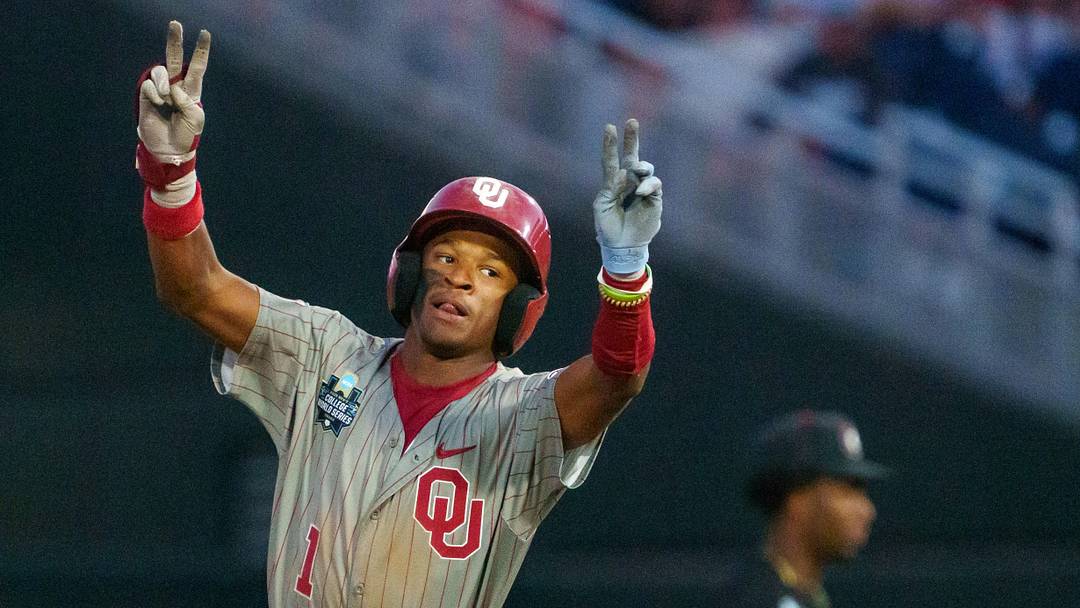 Jun 17, 2026; Omaha, NE, USA; Oklahoma Sooners center fielder Jason Walk (1) celebrates after hitting a home run against the Georgia Bulldogs during the eighth inning at Charles Schwab Field. Mandatory Credit: Dylan Widger-Imagn Images