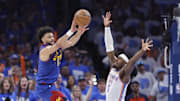 May 13, 2025; Oklahoma City, Oklahoma, USA; Denver Nuggets guard Jamal Murray (27) passes as Oklahoma City Thunder guard Luguentz Dort (5) defends during the second half of game five of the second round for the 2025 NBA Playoffs at Paycom Center. Mandatory Credit: Alonzo Adams-Imagn Images
