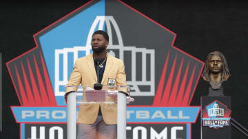 Aug 3, 2024; Canton, OH, USA;  Devin Hester during his acceptance speech into the Pro Football Hall of Fame at the enshrinement ceremony at Tom Benson Hall of Fame Stadium. Mandatory Credit: Charles LeClaire-USA TODAY Sports