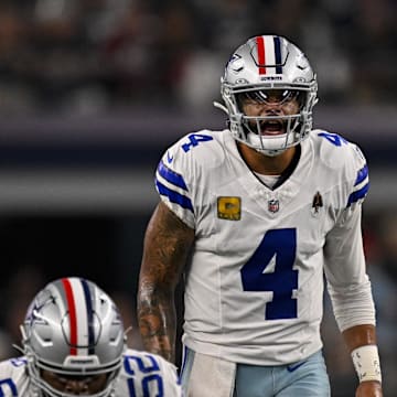 Dallas Cowboys quarterback Dak Prescott (4) sets the play at the line against the Arizona Cardinals. 