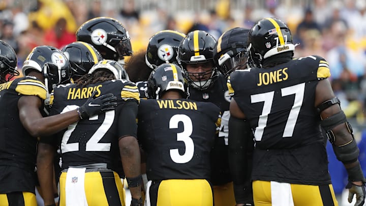 Aug 17, 2024; Pittsburgh, Pennsylvania, USA;  Pittsburgh Steelers quarterback Russell Wilson (3) calls a play in the huddle against the Buffalo Bills during the first quarter at Acrisure Stadium. Mandatory Credit: Charles LeClaire-Imagn Images