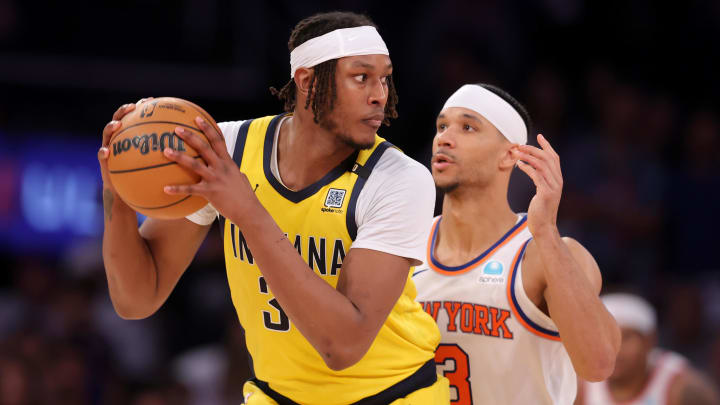 May 19, 2024; New York, New York, USA; Indiana Pacers center Myles Turner (33) handles the ball against New York Knicks guard Josh Hart (3) during the third quarter of game seven of the second round of the 2024 NBA playoffs at Madison Square Garden. Mandatory Credit: Brad Penner-USA TODAY Sports