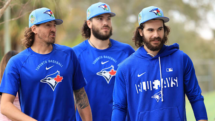 Feb 11, 2026; Dunedin, FL, USA;  Toronto Blue Jays pitcher Kevin Gausman (34), pitcher Dylan Cease (84),  pitcher Cody Ponce (37) workout for spring training practice at Blue Jays Player Development Complex. Mandatory Credit: Kim Klement Neitzel-Imagn Images