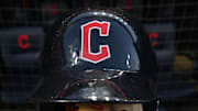 Oct 15, 2022; Cleveland, Ohio, USA; A Cleveland Guardians helmet and glove before game three of the NLDS for the 2022 MLB Playoffs at Progressive Field. Mandatory Credit: Ken Blaze-Imagn Images