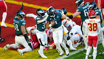 Philadelphia Eagles quarterback Jalen Hurts (1) celebrates scoring a touchdown on a quarterback sneak against the Kansas City Chiefs during the first quarter in Super Bowl LVII at State Farm Stadium in Glendale on Feb. 12, 2023.