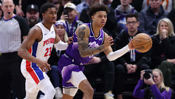 Jan 3, 2024; Salt Lake City, Utah, USA; Utah Jazz guard Keyonte George (3) passes the ball away from Detroit Pistons guard Jaden Ivey (23) during the third quarter at Delta Center. Mandatory Credit: Rob Gray-Imagn Images