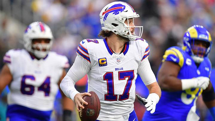 Dec 8, 2024; Inglewood, California, USA; Buffalo Bills quarterback Josh Allen (17) moves out to pass against the Los Angeles Rams during the first half at SoFi Stadium. Mandatory Credit: Gary A. Vasquez-Imagn Images