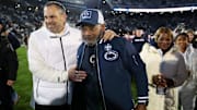 Penn State Nittany Lions interim head coach Terry Smith is congratulated by athletic director Pat Kraft following the game against the Nebraska Cornhuskers at Beaver Stadium. 