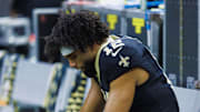 Sep 22, 2024; New Orleans, Louisiana, USA; New Orleans Saints wide receiver Chris Olave (12) reacts to a play in the final minute of the game against the Philadelphia Eagles during the second half at Caesars Superdome. Mandatory Credit: Stephen Lew-Imagn Images