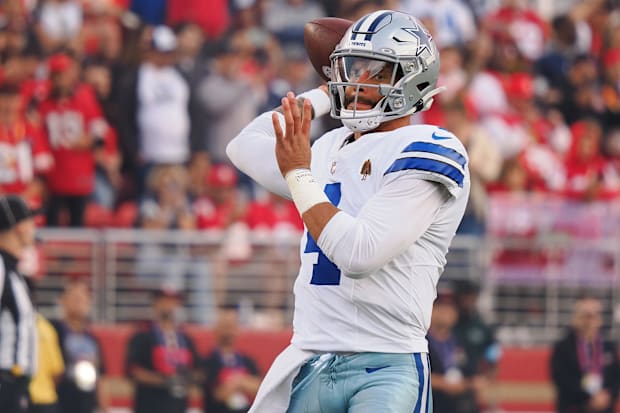 Cowboys QB Dak Prescott throws the ball during warm ups before the game against the San Francisco 49ers at Levi's Stadium.