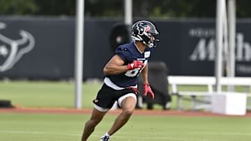Jun 10, 2025; Houston, TX, USA; Houston Texans wide receiver Jayden Higgins (81) participates in a drill during an NFL football minicamp at NRG Stadium. Mandatory Credit: Maria Lysaker-Imagn Images 
