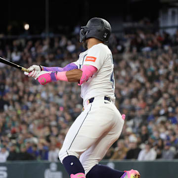 Seattle Mariners center fielder Julio Rodriguez (44) hits a two-RBI double against the New York Yankees during the third inning at T-Mobile Park on May 14.