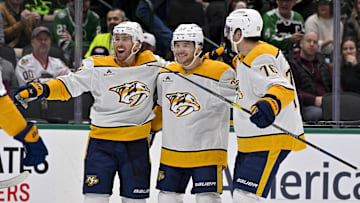 Dec 12, 2024; Dallas, Texas, USA; Nashville Predators right wing Jonathan Marchessault (81) and defenseman Nick Blankenburg (37) and defenseman Brady Skjei (76) celebrate during the game between the Dallas Stars and the Nashville Predators at American Airlines Center. Mandatory Credit: Jerome Miron-Imagn Images