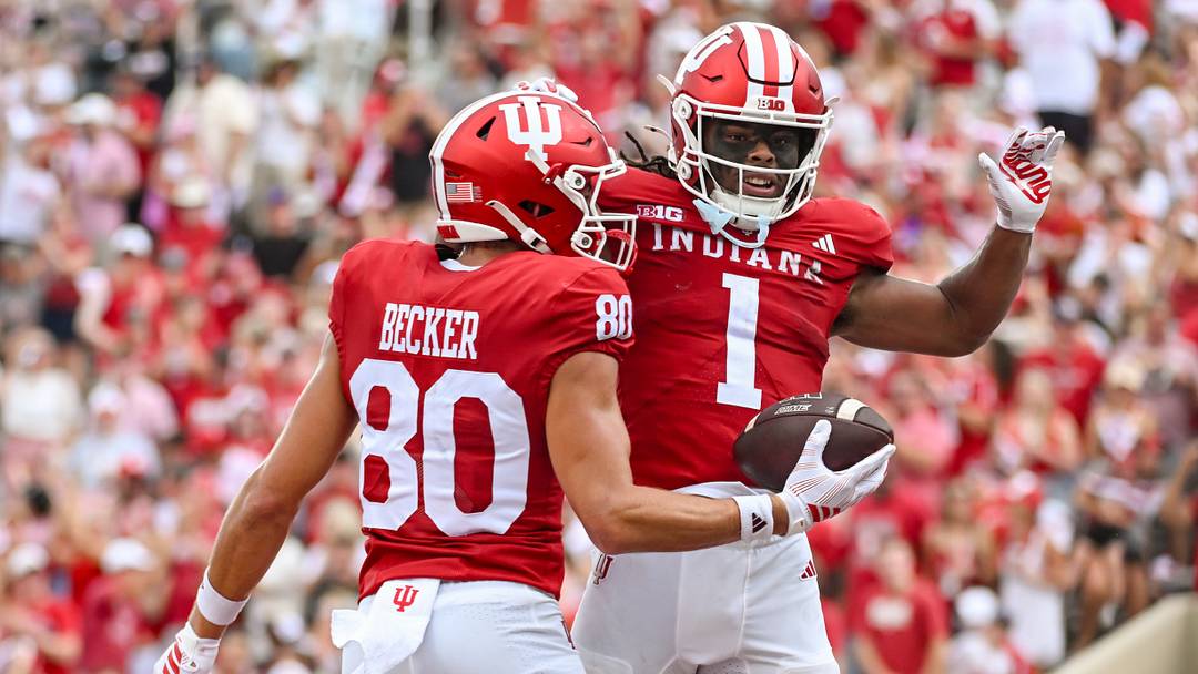 Sep 12, 2026; Bloomington, Indiana, USA; Indiana Hoosiers wide receiver Charlie Becker (80) celebrates with Indiana Hoosiers running back Turbo Richard (1) after a touchdown against the Howard Bison during the first half at Merchants Bank Field at Memorial Stadium. Mandatory Credit: Robert Goddin-Imagn Images Sep 12, 2026; Bloomington, Indiana, USA; Indiana Hoosiers wide receiver Charlie Becker (80) celebrates with Indiana Hoosiers running back Turbo Richard (1) after a touchdown against the Howard Bison during the first half at Merchants Bank Field at Memorial Stadium. Mandatory Credit: Robert Goddin-Imagn Images