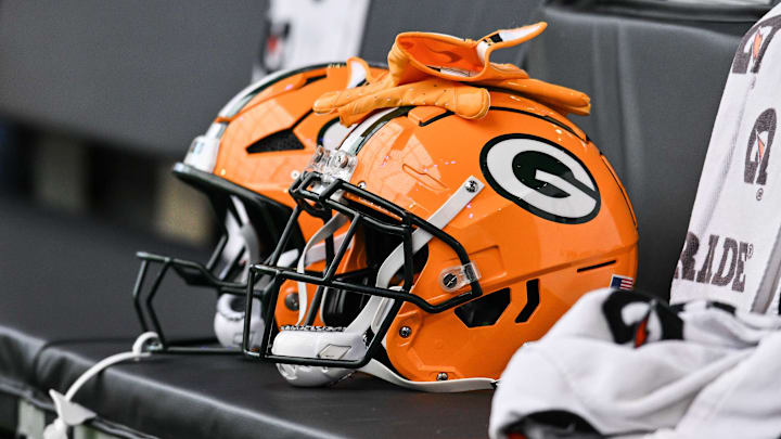 Dec 29, 2024; Minneapolis, Minnesota, USA; A Green Bay Packers helmet sits ready before the game against the Minnesota Vikings at U.S. Bank Stadium. Mandatory Credit: Jeffrey Becker-Imagn Images Dec 29, 2024; Minneapolis, Minnesota, USA; A Green Bay Packers helmet sits ready before the game against the Minnesota Vikings at U.S. Bank Stadium. Mandatory Credit: Jeffrey Becker-Imagn Images