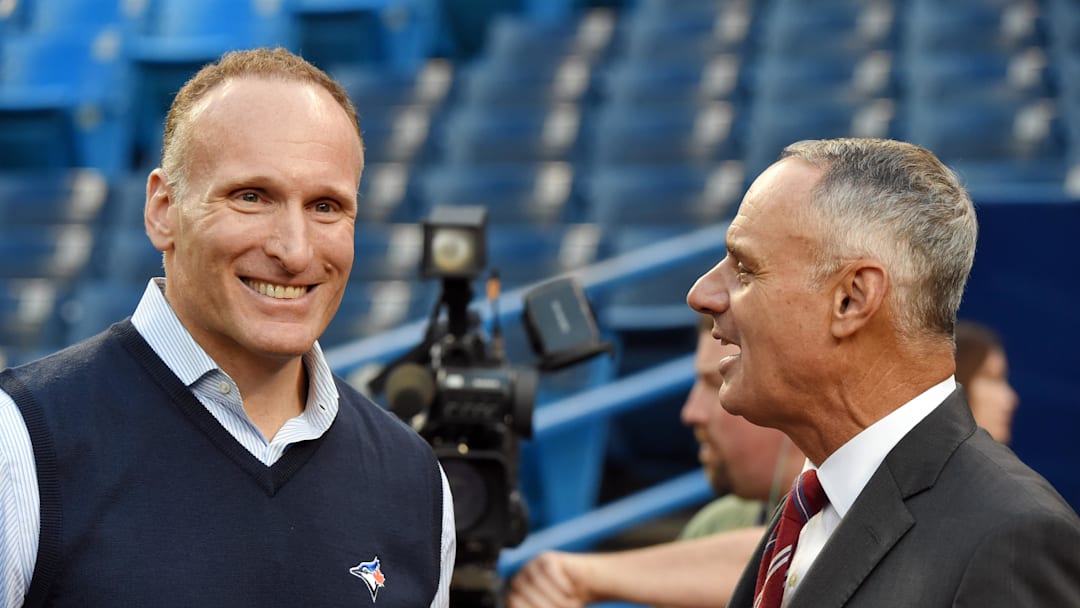 Oct 4, 2016; Toronto, Ontario, CAN; Toronto Blue Jays president Mark Shapiro (left) talks with MLB commissioner Rob Manfred before the American League wild card playoff baseball game against the Baltimore Orioles at Rogers Centre. Mandatory Credit: Dan Hamilton-Imagn Images