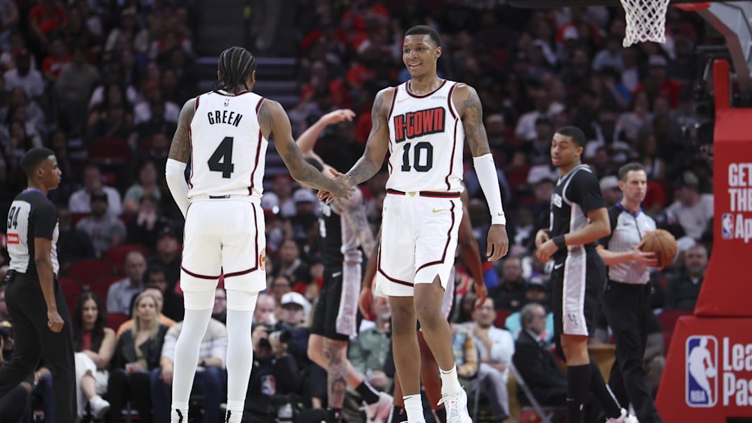 Feb 26, 2025; Houston, Texas, USA; Houston Rockets forward Jabari Smith Jr. (10) celebrates with guard Jalen Green (4) after a play during the second quarter against the San Antonio Spurs at Toyota Center. Mandatory Credit: Troy Taormina-Imagn Images