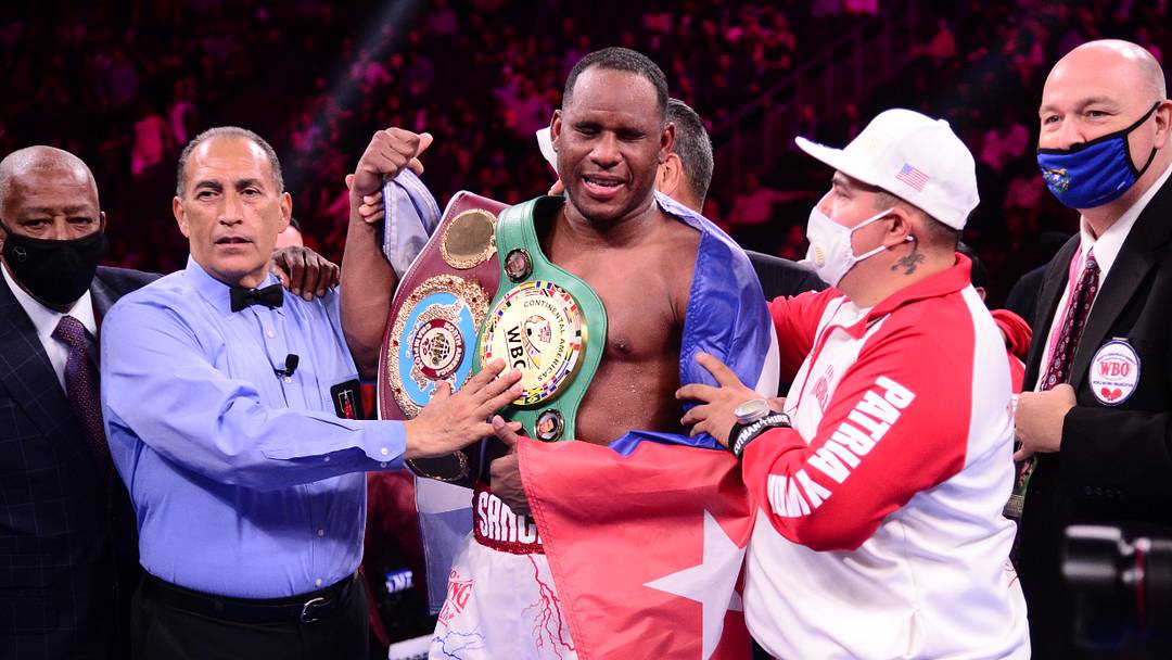 Oct 9, 2021; Las Vegas, Nevada, USA; Frank Sanchez (white/red trunks) and Efe Ajaba (black/gold trunks) during their NABO/WBC Continental Americas heavyweight championship boxing match at T-Mobile Arena. Mandatory Credit: Joe Camporeale-Imagn Images