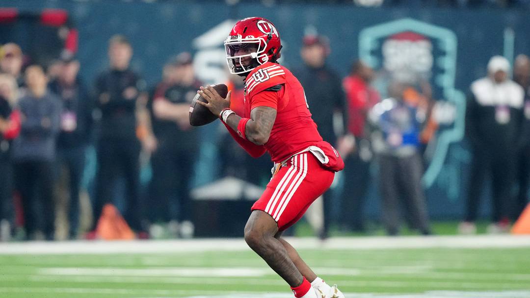 Dec 31, 2025; Las Vegas, NV, USA; Utah Utes quarterback Devon Dampier (4) throws the ball against the Nebraska Cornhuskers in the first half during the SRS Distribution Las Vegas Bowl at Allegiant Stadium. Mandatory Credit: Kirby Lee-Imagn Images