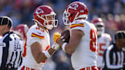 Nov 24, 2024; Charlotte, North Carolina, USA; Kansas City Chiefs tight end Noah Gray (83) and tight end Travis Kelce (87) celebrate his score against the Carolina Panthers during the first quarter at Bank of America Stadium. Mandatory Credit: Jim Dedmon-Imagn Images
