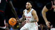 Houston Cougars guard Emanuel Sharp (21) dribbles in the second half of a first round men’s NCAA Tournament game against the SIU Edwardsville Cougars at Intrust Bank Arena