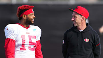 San Francisco 49ers wide receiver Jauan Jennings (L) and head coach Kyle Shanahan (R)