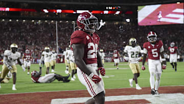 Sep 7, 2024; Tuscaloosa, Alabama, USA;  Alabama Crimson Tide running back Jam Miller (26) celebrates after a touchdown run against the South Florida Bulls at Bryant-Denny Stadium. Alabama won 42-16. Mandatory Credit: Gary Cosby Jr.-Imagn Images