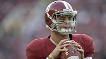 Oct 19, 2013; Tuscaloosa, AL, USA; Alabama Crimson Tide quarterback A.J. McCarron (10) passing during pre game warmups prior to their game against the Arkansas Razorbacks at Bryant-Denny Stadium. Mandatory Credit: John David Mercer-Imagn Images