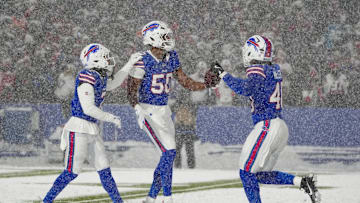 Dec 1, 2024; Orchard Park, New York, USA; Buffalo Bills defensive end Greg Rousseau (50) celebrates recovering a fumble with Buffalo Bills cornerback Taron Johnson (7) and Buffalo Bills linebacker Von Miller (40) during the second half against the San Francisco 49ers at Highmark Stadium. Mandatory Credit: Gregory Fisher-Imagn Images