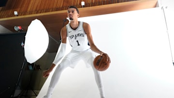 Sep 29, 2025; San Antonio, TX, USA; San Antonio Spurs forward-center Victor Wembanyama (1) poses for photos during Media Day at Victory Capital Performance Center in San Antonio. Mandatory Credit: Scott Wachter-Imagn Images