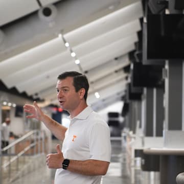 Deputy Athletics Director and Chief Operating Officer of Tennessee Athletics Ryan Alpert gives a tour of the Lower West Club in Neyland Stadium, Wednesday, Aug. 23, 2023. Millions of dollars have been invested in Neyland over the off season.